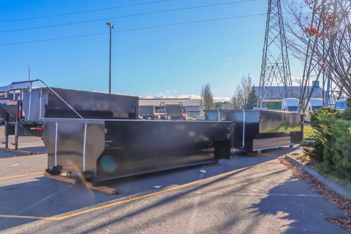 Roll-off dumpster ready for waste disposal at job site for Roofing Dumpster Rental in Oak Ridge